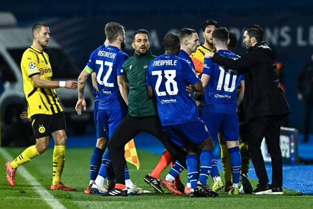 GNK Dinamo v Borussia Dortmund - UEFA Champions League 2024 25 League Phase MD5 Tension between Martin Baturina of Dinamo Zagreb and Ramy Bensebaini of Borussia Dortmund during the UEFA Champions League 2024 25 League Phase MD5 match between GNK Dinamo Zagreb and Borussia Dortmund at Maksimir stadium on November 27, 2024 in Zagreb, Croatia.  MarkoxLukunic PIXSELL