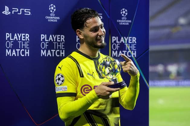 GNK Dinamo v Borussia Dortmund - UEFA Champions League 2024 25 League Phase MD5 Ramy Bensebaini receives an award for the best player of the match after the UEFA Champions League 2024 25 League Phase MD5 match between GNK Dinamo Zagreb and Borussia Dortmund at Maksimir stadium on November 27, 2024 in Zagreb, Croatia.  LukaxStanzl PIXSELL