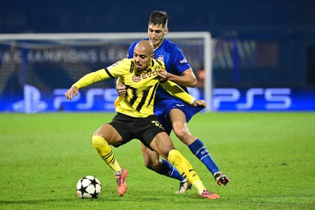 Zagreb, Croatia, 271124. Players Raul Torrente and Donyell Malen at the match of the 5th round of the UEFA Champions League, GNK Dinamo - Borussia Dortmund. Photo: Goran Mehkek CROPIX Zagreb Croatia Copyright: xxGoranxMehkekx xCROPIXx gm_dinamo_borussia55-271124