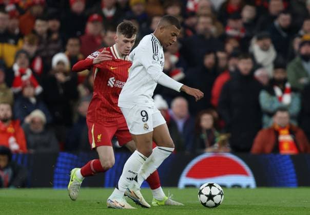 - Liverpool v Real Madrid, UEFA Champions League, League Phase, Anfield Stadium, Liverpool, UK - 27th November 2024. Daniel Weir Crystal Pix Kylian Mbappe of Real Madrid battles Conor Bradley of Liverpool. - Liverpool v Real Madrid, UEFA Champions League, League Phase, Anfield Stadium, Liverpool, UK - 27th November 2024. Daniel Weir Crystal Pix Liverpool Anfield Stadium UK Copyright: xDanxWeirx CP_Liverpool_Real_Madrid_76