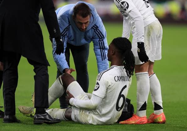 27th November 2024; Anfield, Liverpool, Merseyside, England; Champions League Football, Liverpool versus Real Madrid; Eduardo Camavinga of Real Madrid receives treatment after he is injured  ActionPlus12720713 DavidxBlunsden