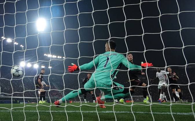 (241128) -- BOLOGNA, Nov. 28, 2024 -- Bologna s goalkeeper Lukasz Skorupski fails to save the goal by Lille s Ngal Ayel Mukau during the league phase match between Bologna and Lille at the UEFA Champions League in Bologna, Italy, Nov. 27, 2024. (Photo by Xinhua) (SP)ITALY-BOLOGNA-FOOTBALL-UEFA CHAMPIONS LEAGUE-BOLOGNA VS LILLE AlbertoxLingria 