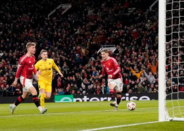 Manchester, England, 28th November 2024. Alejandro Garnacho of Manchester United, ManU scores the first goal during the UEFA Europa League match at Old Trafford, Manchester. Picture credit should read: Andrew Yates Sportimage EDITORIAL USE ONLY. No use with unauthorised audio, video, data, fixture lists, club league logos or live services. Online in-match use limited to 120 images, no video emulation. No use in betting, games or single club league player publications. SPI-3487-0014