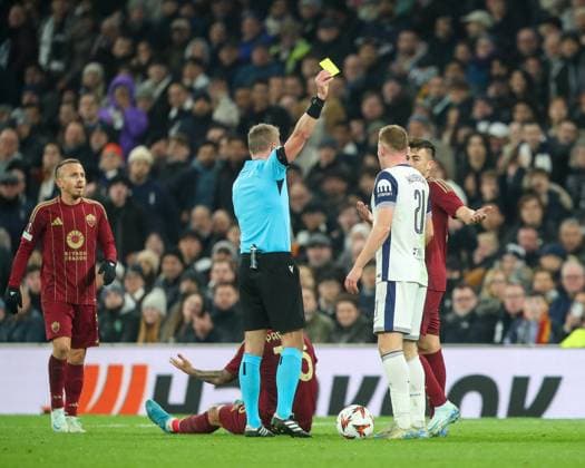 UEFA Europa League - League Stage Tottenham Hotspur v A.S. Roma Referee Glenn Nyberg gives a yellow card to Dejan Kulusevski of Tottenham Hotspur during the UEFA Europa League - League Stage match Tottenham Hotspur vs A.S. Roma at Tottenham Hotspur Stadium, London, United Kingdom, 28th November 2024 (Photo by Gareth Evans News Images) London Tottenham Hotspur Stadium United Kingdom Copyright: xGarethxEvans NewsxImagesx
