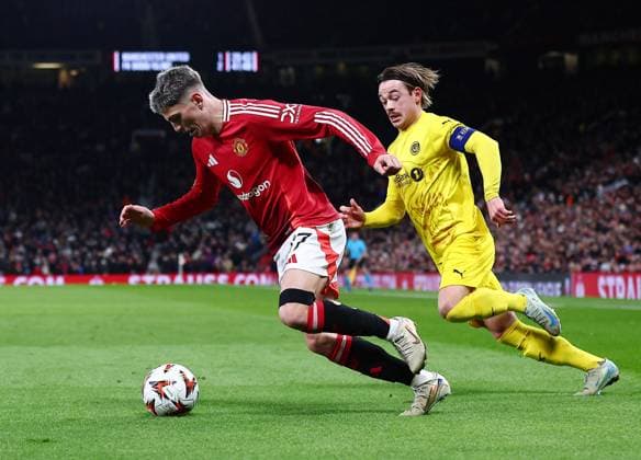 Alejandro Garnacho of Manchester United, ManU and Patrick Berg of Bodo Glimt Manchester United v Bodo Glimt, UEFA Europa League, Group Stage, Football, Old Trafford, Manchester, UK - 28 Nov 2024 EDITORIAL USE ONLY No use with unauthorised audio, video, data, fixture lists, club league logos or live services. Online in-match use limited to 120 images, no video emulation. No use in betting, games or single club league player publications. Copyright: xMattxWest Shutterstockx 14945052ad
