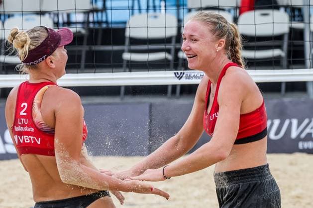 (241129) -- LAGUNA PROVINCE, Nov. 29, 2024 -- Ieva Dumbauskaite (R) and Ieva Vasiliauskaite (L) of Lithuania celebrate after scoring a point during the women s pool F match between Lithuania and the Philippines at the 2024 Volleyball World Beach Pro Tour Challenge in Laguna Province, the Philippines on Nov. 29, 2024. ) (SP)PHILIPPINES-LAGUNA PROVINCE-VOLLEYBALL WORLD BEACH PRO TOUR CHALLENGE ROUELLExUMALI 