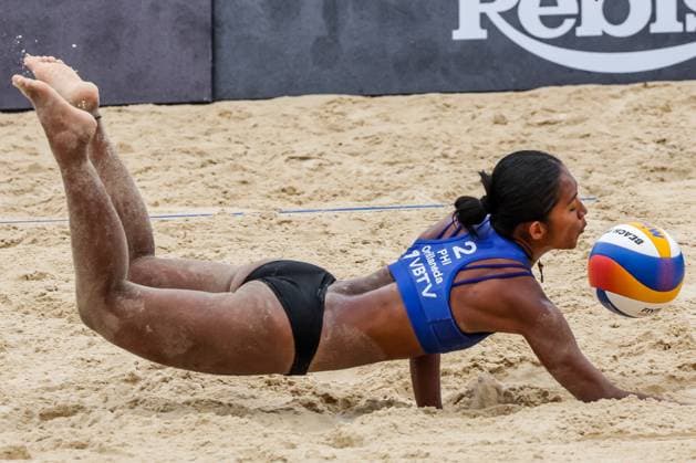 (241129) -- LAGUNA PROVINCE, Nov. 29, 2024 -- Mary Klymince Orillaneda of the Philippines tries to save the ball during the women s pool F match between Lithuania and the Philippines at the 2024 Volleyball World Beach Pro Tour Challenge in Laguna Province, the Philippines on Nov. 29, 2024. ) (SP)PHILIPPINES-LAGUNA PROVINCE-VOLLEYBALL WORLD BEACH PRO TOUR CHALLENGE ROUELLExUMALI 