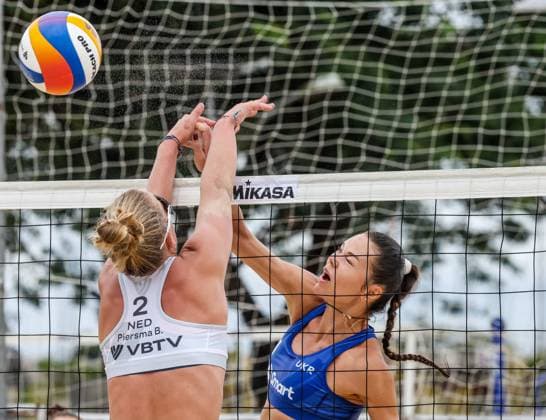 (241129) -- LAGUNA PROVINCE, Nov. 29, 2024 -- Maryna Hladun (R) of Ukraine competes against Brecht Piersma of the Netherlands during the women s pool E match between the Netherlands and Ukraine at the 2024 Volleyball World Beach Pro Tour Challenge in Laguna Province, the Philippines, Nov. 29, 2024. ) (SP)PHILIPPINES-LAGUNA PROVINCE-VOLLEYBALL WORLD BEACH PRO TOUR CHALLENGE RouellexUmali 