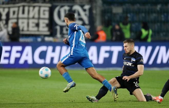 Baris Atik on the ball, Jonjoe Kenny duel Match scene Action Sport Football Soccer 2 Bundesliga Men 14 Matchday Season 2024 2025 29 11 2024 1 FC Magdeburg FCM vs Hertha BSC Berlin DFL regulations prohibit any use of photographs as image sequences and or quasi video