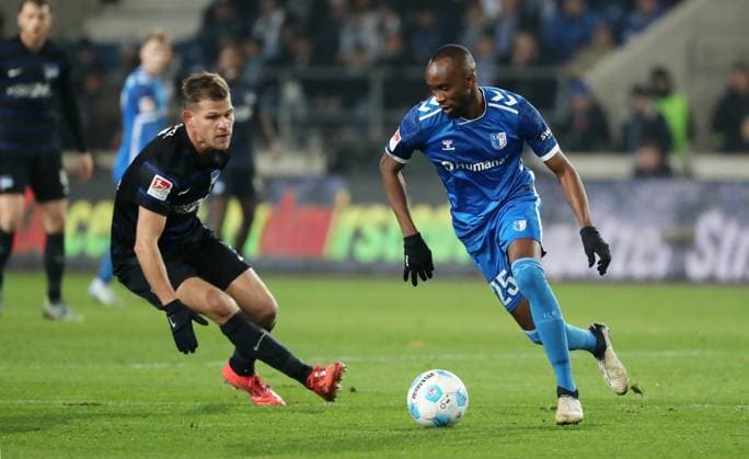 Florian Niederlechner, Silas Gnaka on the ball duel Match scene Action Sport Football Soccer 2 Bundesliga Men 14 Matchday Season 2024 2025 29 11 2024 1 FC Magdeburg FCM vs Hertha BSC Berlin DFL regulations prohibit any use of photographs as image sequences and or quasi video