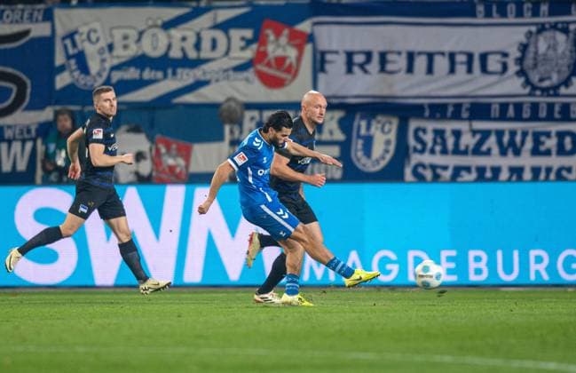 Soccer, Men, Season 2024 2025, 2 Bundesliga 14 Matchday , 1 FC Magdeburg Hertha BSC, Mohammed El Hankouri 1 FC Magdeburg scores the goal for 1 0 against Toni Leistner Hertha BSC , 29 11 2024, Copyright: xSebastianxRäppold MatthiasxKochx