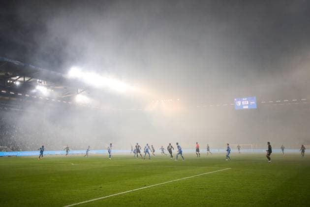 Referee Richard Hempel interrupts the match due to pyrotechnics being set off in the Hertha BSC Berlin fan block 2 Soccer Bundesliga season 2024 2025 1 FC Magdeburg vs Hertha BSC Berlin at the Avnet Arena in Magdeburg Action,Soccer,Man,Men,Germany,29 11 2024