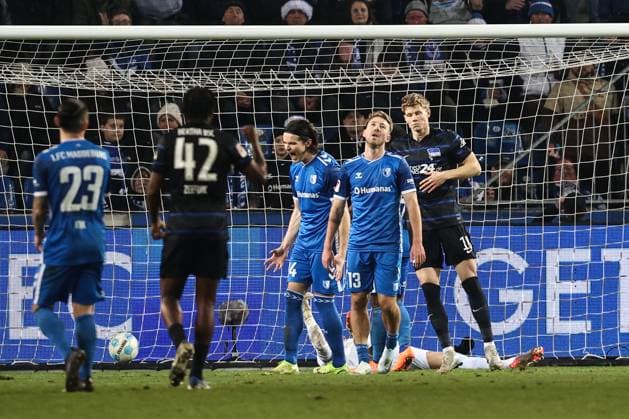 Goalscorer Luca Schuler Hertha BSC,18 scores 1 3, Connor Krempicki 1 FC Magdeburg,13 and Jean Hugonet 1 FC Magdeburg,24 stand by disappointed 2 Soccer Bundesliga Season 2024 2025 1 FC Magdeburg vs Hertha BSC Berlin at the Avnet Arena in Magdeburg Action,Soccer,Man,Men,Germany,29 11 2024