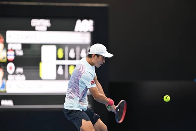 CHENGDU, CHINA - NOVEMBER 30: Rio Noguchi of Japan competes in the Men s Singles Final match against Kasidit Samrej of Thailand on day 6 of 2025 Australian Open Asia-Pacific Wildcard Play-off at Sichuan International Tennis Centre on November 30, 2024 in Chengdu, Sichuan Province of China.  Copyright: xVCGx 111533787212