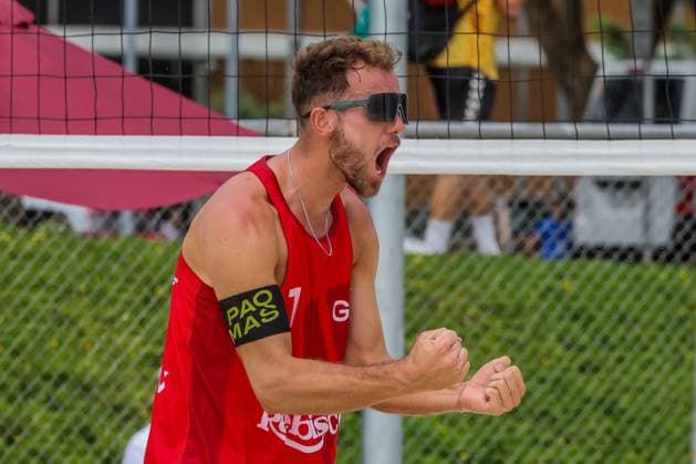 (241130) -- LAGUNA PROVINCE, Nov. 30, 2024 -- Jonas Sagstetter of Germany reacts after scoring a point during the men s round of 18 match between Germany and Latvia at the 2024 Volleyball World Beach Pro Tour Challenge in Laguna Province, the Philippines on Nov. 30, 2024. ) (SP)PHILIPPINES-LAGUNA PROVINCE-VOLLEYBALL WORLD BEACH PRO TOUR CHALLENGE ROUELLExUMALI 