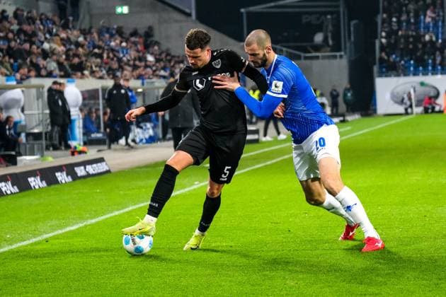 Yassine Bouchama Preußen Muenster, 05 in duel with Aleksandar Vukotic SV Darmstadt 98, 20 , GER, SV Darmstadt 98 vs Preußen Muenster, Soccer, 2 Bundesliga, Matchday 14, Season 2024 2025, 30 11 2024 DFL REGULATIONS PROHIBIT ANY USE OF PHOTOGRAPHS as IMAGE SEQUENCES and or QUASI VIDEO GER, SV Darmstadt 98 vs Preußen Muenster, Football, 2 Bundesliga, Matchday 14, Season 2024 2025, 30 11 2024 Darmstadt Copyright: xEibner-Pressefoto FlorianxWieganx EP_FWD