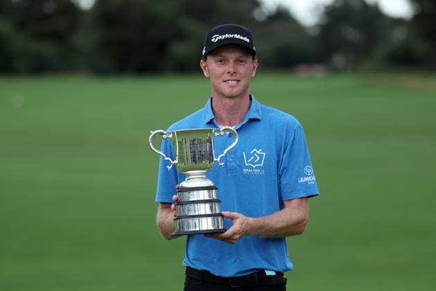 GOLF AUSTRALIAN OPEN, Ryggs Johnston poses for a photo with the winners trophy at the conclusion of day four of the ISPS HANDA Australian Open at Kingston Heath Golf Club in Melbourne, Sunday, December 1, 2024. ( NO ARCHIVING, EDITORIAL USE ONLY, NO USE IN BOOKS WITHOUT CONSENT MELBOURNE VICTORIA AUSTRALIA  Copyright: xCONxCHRONISx 20241201163692342656