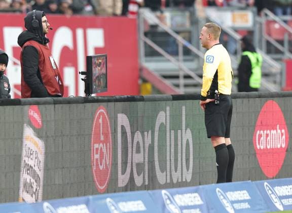 01 12 2024 Soccer season 2024 2025 2 Soccer Bundesliga 14 Matchday 1 FC Nürnberg FCN Club Fortuna Düsseldorf 1895 F95 Sportfoto Zink DaMa xdaxmax DFL regulations prohibit any use of photographs as image sequences and or quasi video only for editorial use Lars Erbst Referee checks video evidence