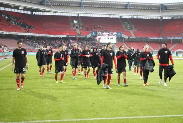 01 12 2024 Soccer Season 2024 2025 2 Soccer Bundesliga 14 Matchday 1 FC Nürnberg FCN Club Fortuna Düsseldorf 1895 F95 Sportfoto Zink DaMa xdaxmax DFL regulations prohibit any use of photographs as image sequences and or quasi video only for editorial use Mannschaft Team of FCN disappointed Disappointment after the end of the match Mannschaft Team wears T Shirt of Nordkurve Nürnberg in memory of a deceased Clubfan Clubfans FCN Fans Fans