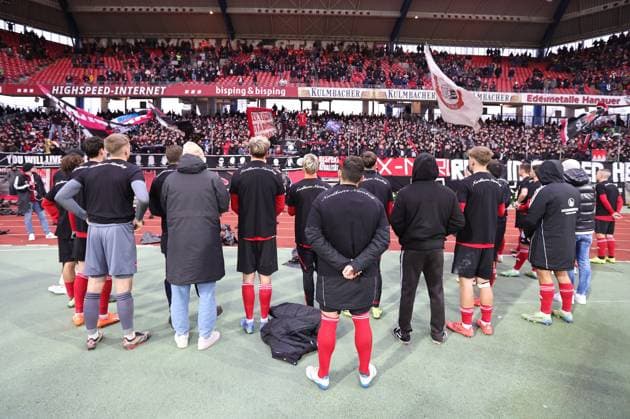 01 12 2024 Soccer Season 2024 2025 2 Soccer Bundesliga 14 Matchday 1 FC Nürnberg FCN Club Fortuna Düsseldorf 1895 F95 Sportfoto Zink DaMa xdaxmax DFL regulations prohibit any use of photographs as image sequences and or quasi video only for editorial use Mannschaft Team of FCN disappointed Disappointment after the end of the match Mannschaft Team wears T Shirt of Nordkurve Nürnberg in memory of a deceased Clubfan Clubfans FCN Fans Fans