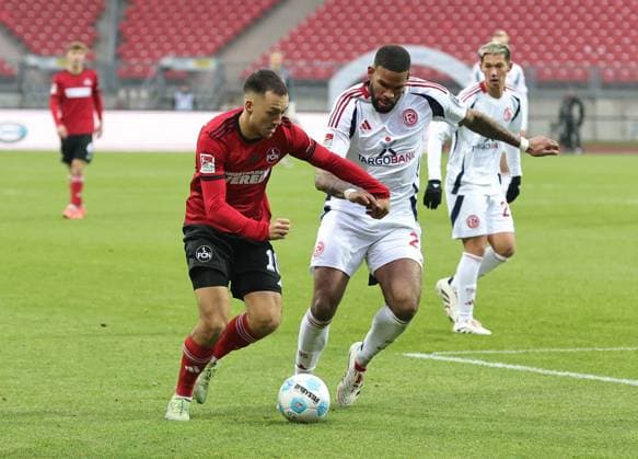 01 12 2024 Soccer Season 2024 2025 2 Soccer Bundesliga 14 Matchday 1 FC Nürnberg FCN Club Fortuna Düsseldorf 1895 F95 Sportfoto Zink DaMa xdaxmax DFL regulations prohibit any use of photographs as image sequences and or quasi video only for editorial use Julian Justvan 10, 1 FC Nürnberg FCN Jamil Siebert 20, Fortuna Düsseldorf F95