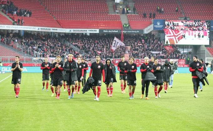 01 12 2024 Soccer Season 2024 2025 2 Soccer Bundesliga 14 Matchday 1 FC Nürnberg FCN Club Fortuna Düsseldorf 1895 F95 Sportfoto Zink DaMa xdaxmax DFL regulations prohibit any use of photographs as image sequences and or quasi video only for editorial use Mannschaft Team of FCN disappointed Disappointment after the end of the match Mannschaft Team wears T Shirt of Nordkurve Nürnberg in memory of a deceased Clubfan Clubfans FCN Fans Fans