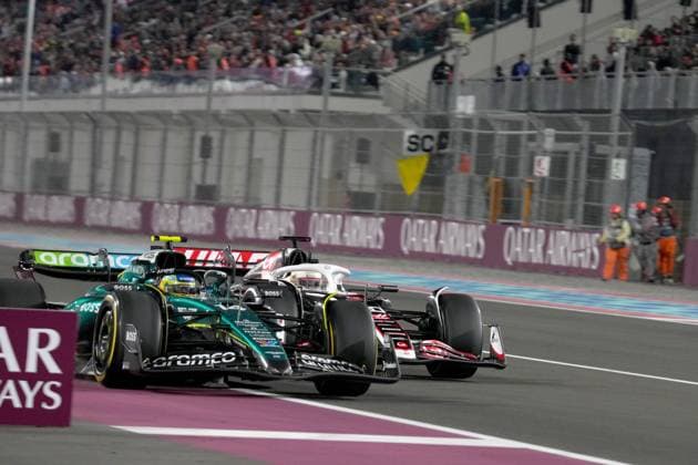 01 12 2024, Losail International Circuit, Doha, Formula 1 Qatar Airways Qatar Grand Prix 2024 ,in the picture Fernando Alonso ESP , Aston Martin Aramco Cognizant Formula One Team overtakes Kevin Magnussen DNK , MoneyGram Haas F1 Team at the end of the pit lane Photo by Hasan Bratic DeFodi Images Defodi 506 20241201 hbr 2249 Defodi-506