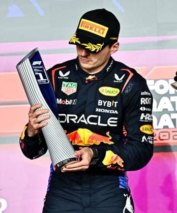 FORMULA ONE QATAR GRAND PRIX 2024 The winner Netherlands Formula One driver Max Verstappen of Red Bull Racing celebrates with trophy on the podium after after the Formula 1 Grand Prix of Qatar at Lusail International Circuit in Lusail, Qatar,, on December 1, 2024. DOHA Qatar Copyright: xNOUSHADx