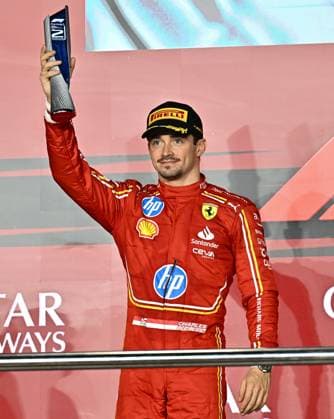 FORMULA ONE QATAR GRAND PRIX 2024 Second place winner Monaco s Formula One driver Charles Leclerc of Ferrari celebrates with trophy on the podium after the Formula 1 Grand Prix of Qatar at Lusail International Circuit in Lusail, Qatar,, on December 1, 2024. DOHA Qatar Copyright: xNOUSHADx