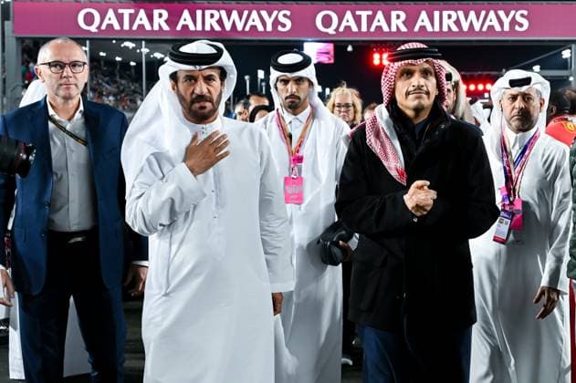 FORMULA ONE QATAR GRAND PRIX 2024 Qatar Prime Minister Mohammed bin Abdulrahman bin Jassim Al Thani (C-R) and FIA president Mohammed Ben Sulayem (C-L) walk on the starting grid before the Formula 1 Grand Prix of Qatar at Lusail International Circuit in Lusail, Qatar,, on December 1, 2024. DOHA Qatar Copyright: xNOUSHADx