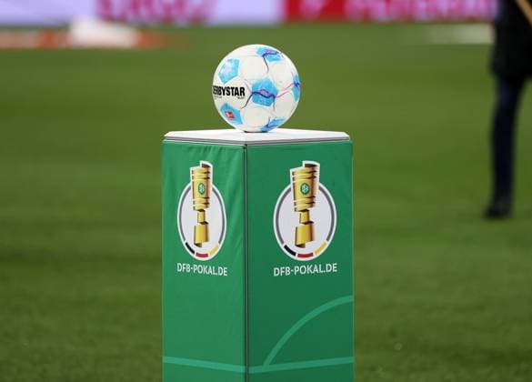 Munich, Germany, 03 December 2024 Football, Men, DFB Cup, Round of 16, Season 2024 2025, FC Bayern Munich Bayer 04 Leverkusen, Allianz Arena Here the match ball lying on a pedestal with the DFB Cup logo, symbolic image DFB, DFL regulations prohibit any use of photographs as image sequences and or quasi video