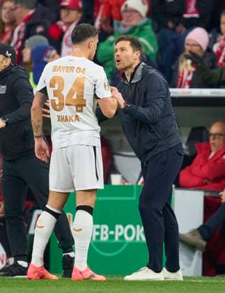 Granit Xhaka, Lev 34 Xabi Alonso, Trainer, headcoach teammanager Leverkusen in the DFB-Pokal match FC BAYERN MUENCHEN - BAYER 04 LEVERKUSEN 0-1 of German Football Cup on Dec 3, 2024 in Munich, Germany. Season 2024 2025