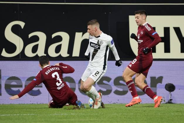 06 12 2024, Football, Men, 2 Bundesliga, Season 2024 2025, SV 07 Elversberg 1 FC Nuernberg, Elias Baum SV 07 Elversberg , Danilo Soares 1 FC Nuernberg , Stefanos Tzimas 1 FC Nuernberg Elversberg Ursapharm Arena an der Kaiserlinde Saarland Germany EN Copyright: xSebastianxBachx