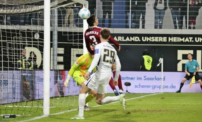 06 12 2024, xmohx, Soccer 2 Bundesliga, SV Elversberg 1 FC Nürnberg emspor, v l Nürnbergs Danilo Soares clears in highest distress in front of Tom Zimmerschied Elversberg and deflects the ball to the post DFL DFB REGULATIONS PROHIBIT ANY USE OF PHOTOGRAPHS as IMAGE SEQUENCES and or QUASI VIDEO Elversberg