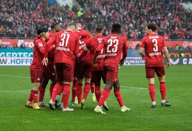 Soccer 2 Bundesliga Season 2024 25 1 FC Kaiserslautern 07 12 2024 Fritz Walter Stadion 1 FC Kaiserslautern fck Karlsruher SC ksc Lauterer Jubeltraube after the 1 0 1 FC Kaiserslautern
