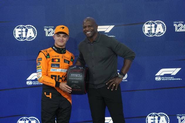 07 12 2024, Yas Marina Circuit, Abu Dhabi, Formula 1 Etihad Airways Abu Dhabi Grand Prix 2024 , pictured For pole position Lando Norris GBR , McLaren F1 Team receives the Pirelli Tire Award from the hands of actor Terry Crews Photo by Hasan Bratic DeFodi Images Defodi 506 20241207 hbr 6127 Defodi-506