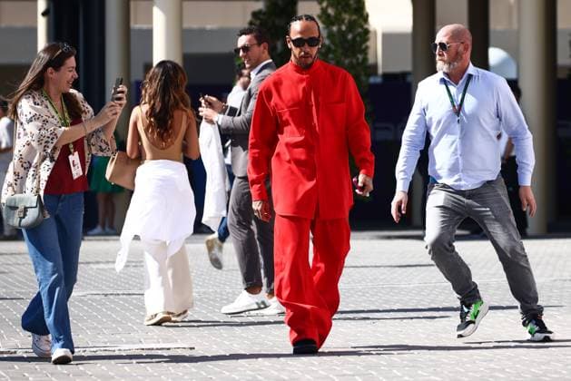 F1 Abu Dhabi Grand Prix Lewis Hamilton of Mercedes dressed all in red arrives on the paddock on a race day of Formula 1 Abu Dhabi Grand Prix at Yas Marina Circuit on December 8th, 2024 in Abu Dhabi, United Arab Emirates. Abu Dhabi United Arab Emirates  Copyright: xBeataxZawrzelx originalFilename:zawrzel-f1abudha241208_npGAb.jpg