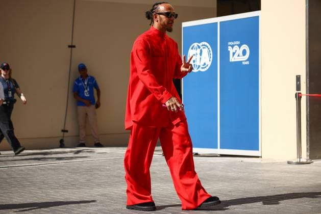 F1 Abu Dhabi Grand Prix Lewis Hamilton of Mercedes dressed all in red arrives on the paddock on a race day of Formula 1 Abu Dhabi Grand Prix at Yas Marina Circuit on December 8th, 2024 in Abu Dhabi, United Arab Emirates. Abu Dhabi United Arab Emirates  Copyright: xBeataxZawrzelx originalFilename:zawrzel-f1abudha241208_nph2D.jpg