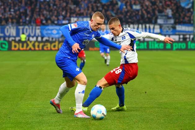 GER,Hamburg, Fußball, DFB, Hamburger SV vs SV Darmstadt 98 , im Hamburger Volksparkstadion , 08 12 2024 , v l Isac Lidberg SV Darmstadt 98 , Miro Muheim Hamburger SV in aktion, in action DFL regulations prohibit any use of photographs as image sequences and or quasi video Copyright: HMBxMedia FernandoxSoares