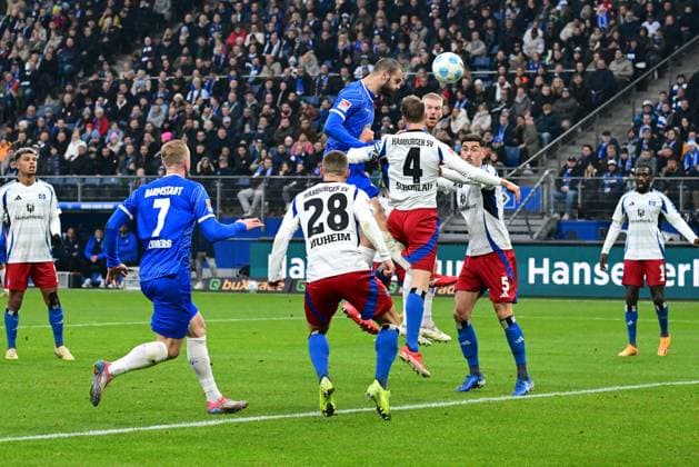 Soccer I Men I 2 Bundesliga l Hamburger SV SV Darmstadt 98 I 15 Matchday I Season 2024 2025 I HSV I 08 12 2024 I v l Vukotic Aleksander Darmstadt 98 kepft against Schonlau Sebastian HSV the 1 1 , Sportplatz Volksparkstadion, Stellingen Hamburg Germany