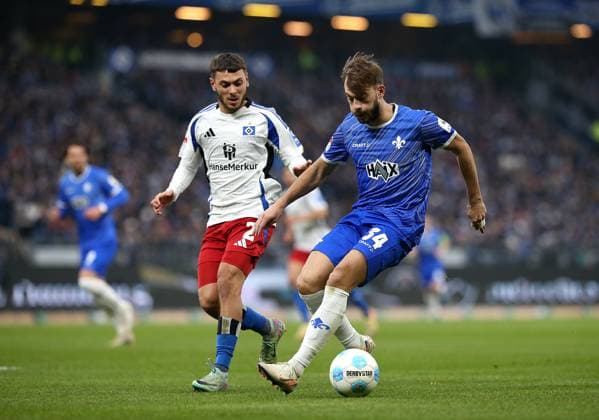 08 12 2024, Soccer 2 Bundesliga 2024 2025, Matchday 15, Hamburger SV SV Darmstadt 98, at Volksparkstadion Hamburg L R William Mikelbrencis Hamburg v Killian Corredor SV Darmstadt 98 DFL and DFB regulations prohibit any use of photographs as image sequences and or quasi video