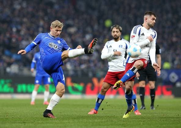 08 12 2024, Soccer 2 Bundesliga 2024 2025, Matchday 15, Hamburger SV SV Darmstadt 98, at Volksparkstadion Hamburg L R Andreas Müller SV Darmstadt 98 vs Lukasz Poreba Hamburg DFL and DFB regulations prohibit any use of photographs as image sequences and or quasi video