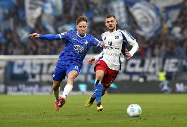 08 12 2024, Soccer 2 Bundesliga 2024 2025, Matchday 15, Hamburger SV SV Darmstadt 98, at Volksparkstadion Hamburg L R Luca Marseiler SV Darmstadt 98 vs Lukasz Poreba Hamburg DFL and DFB regulations prohibit any use of photographs as image sequences and or quasi video
