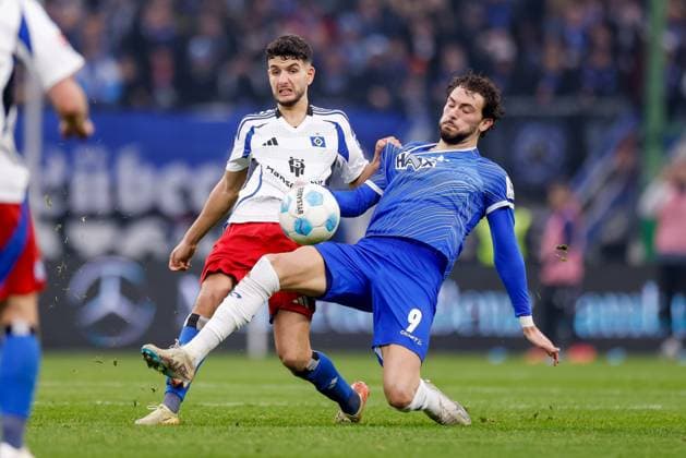 Hamburg, 8 December 2024 Football, 2 Bundesliga 2024 25, Hamburger SV SV Darmstadt 98 Daniel Elfadli Hamburger SV, 8 , Fraser Hornby SV Darmstadt 98, 9 DFL REGULATIONS PROHIBIT ANY USE OF PHOTOGRAPHS AS IMAGE SEQUENCES AND OR QUASI VIDEO