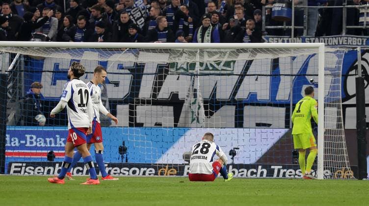 Disappointment at Hamburg Immanuel Pherai HSV , Sebastian Schonlau HSV , Miro Muheim HSV , Daniel Heuer Fernandes HSV Football, Men, Season 2024 2025, 2 BL, Volksparkstadion, Hamburger SV vs SV Darmstadt 98, 2 2 DFL REGULATIONS PROHIBIT ANY USE OF PHOTOGRAPHS AS IMAGE SEQUENCES AND OR QUASI VIDEO