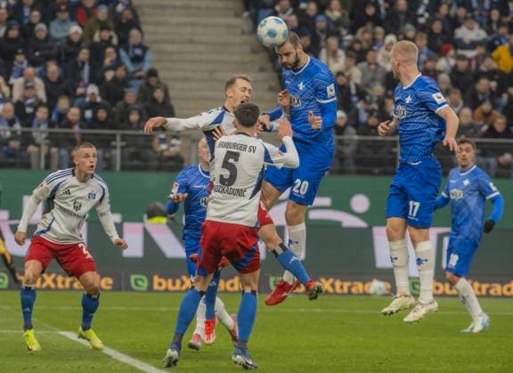 Hamburger SV vs SV Darmstadt 98 2 2 08 12 2024, Volksparkstadion, BundesLiga match, 2 Bundesliga, Hamburger SV vs SV Darmstadt 98 2 2 in picture Sebastian Schonlau and Dennis Hadzikadunic Hamburger SV cannot prevent Aleksandar Vukotics header SV Darmstadt 98 1 1 for SV Darmstadt 98 Â