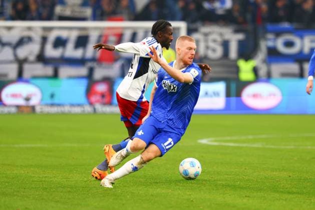 GER,Hamburg, Fußball, DFB, Hamburger SV vs SV Darmstadt 98 , im Hamburger Volksparkstadion , 08 12 2024 , v l Kai Klefisch SV Darmstadt 98 , Bakery Jatta Hamburger SV in aktion, in action DFL regulations prohibit any use of photographs as image sequences and or quasi video Copyright: HMBxMedia FernandoxSoares