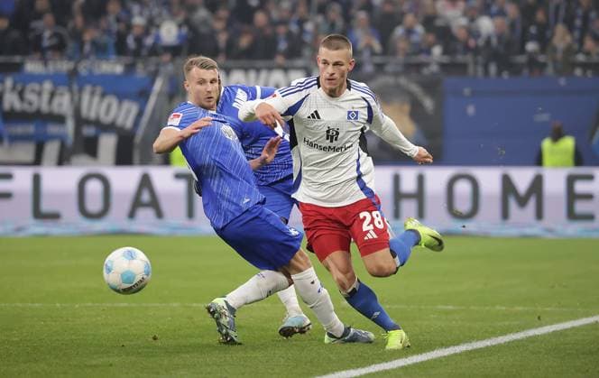 Miro Muheim HSV in duel with Darmstadts Marco Thiese Football, Men, Season 2024 2025, 2 BL, Volksparkstadion, Hamburger SV vs SV Darmstadt 98, 2 2 DFL REGULATIONS PROHIBIT ANY USE OF PHOTOGRAPHS AS IMAGE SEQUENCES AND OR QUASI VIDEO