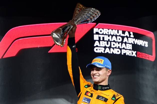 December 8, 2024, Abu Dhabi, United Arab Emirates: Lando Norris of McLaren celebrates on the podium during Formula 1 Abu Dhabi Grand Prix at Yas Marina Circuit on December 8th, 2024 in Abu Dhabi, United Arab Emirates. Abu Dhabi United Arab Emirates - ZUMAz156 0783737284st Copyright: xBeataxZawrzelx