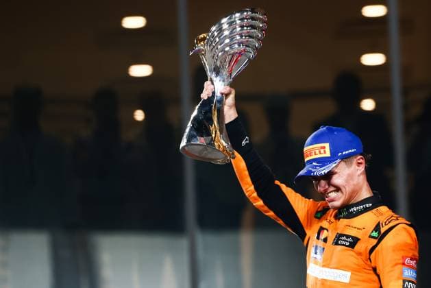 December 8, 2024, Abu Dhabi, United Arab Emirates: Lando Norris of McLaren celebrates on the podium during Formula 1 Abu Dhabi Grand Prix at Yas Marina Circuit on December 8th, 2024 in Abu Dhabi, United Arab Emirates. Abu Dhabi United Arab Emirates - ZUMAz156 0783737541st Copyright: xBeataxZawrzelx